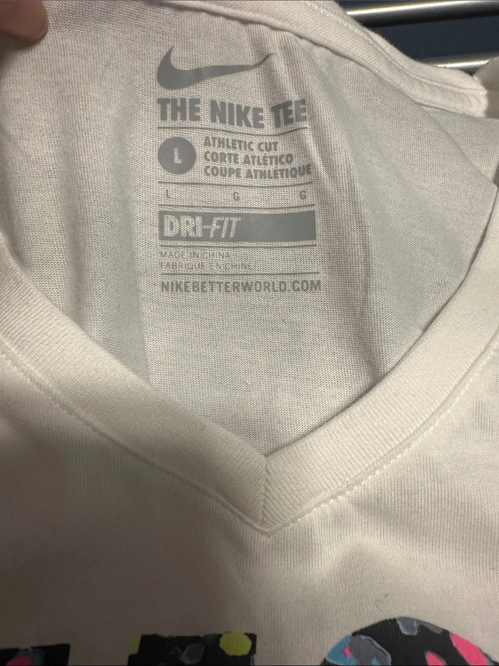 NWOT Nike Women’s White V-Neck Tee with Multicolor Confetti JUST DO IT.